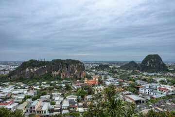 Aerial view to Marble Mountains and Da Nang suburban architecture, Vietnam. 