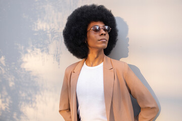 Person wearing a stylish brown blazer