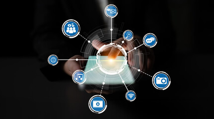 A person holds a digital tablet displaying icons that represent communication, media, and technology in a sleek, modern design, emphasizing digital interactions. Crux