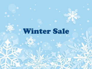 Winter sale. Blue background with snowflakes and inscription.