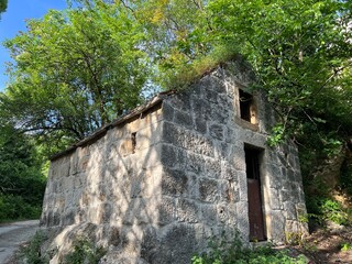 Protected cultural heritage Grabske mlinice or a complex of old mills below the source of the Grab River (Trilj, Croatia) - Za&scaron;tićeno kulturno dobro Grabske mlinice ispod izvora rijeke Grab