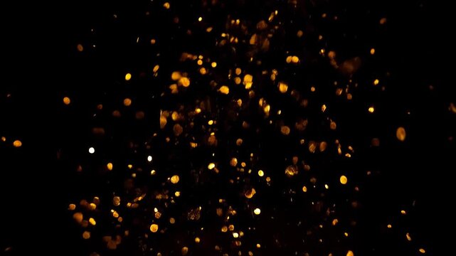 Glowing lanterns flying up into the night sky in a magical display