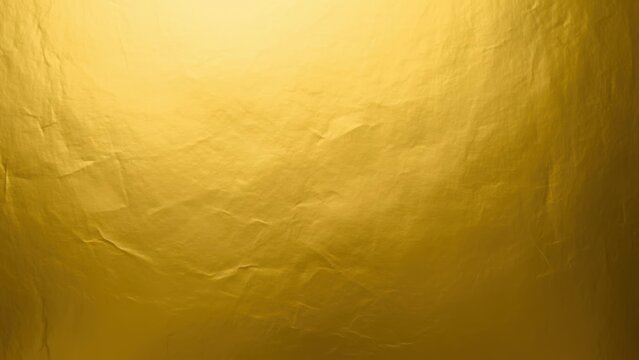 Christmas Abstract shiny gold foil texture background with crinkled surface and warm lighting