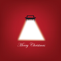 A sleek dark car with illuminated headlights shines brightly on a vibrant red background with a christmas greeting