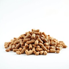 Pile of light brown wood pellets for heating. Compressed biomass fuel material isolated on a clean white background. Eco-friendly alternative energy source closeup.