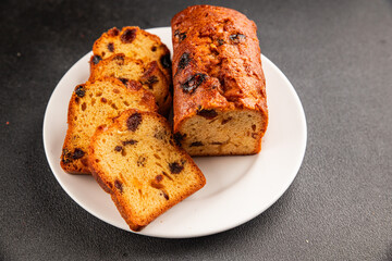 Fruit cake sweet pastry fruitcake dessert dried fruits, nuts traditional baked goods natural product tasty snack fresh delicious gourmet food background on the table rustic top view copy space