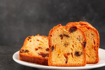 Fruit cake sweet pastry fruitcake dessert dried fruits, nuts traditional baked goods natural product tasty snack fresh delicious gourmet food background on the table rustic top view copy space
