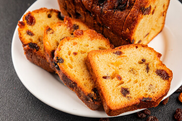 Fruit cake sweet pastry fruitcake dessert dried fruits, nuts traditional baked goods natural product tasty snack fresh delicious gourmet food background on the table rustic top view copy space