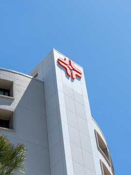 Houston, TX, USA - April 11, 2024: HCA Houston Healthcare logo on top of the building at HCA Houston Healthcare Medical Center on Hermann Dr in Houston, TX, USA