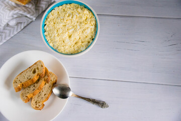 Whole grain baguette made from buckwheat flour and sesame seeds, and salad with egg