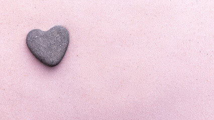 Fototapeta premium Heart Shaped Stone on Sand