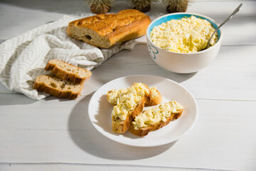 Sandwich with egg and delicious whole grain baguette with sesame seeds. Nutritious breakfast concept