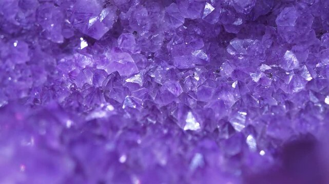 Stones and minerals, riches of Earth. methyst - mineral of quartz group. Natural amethyst crystal geode. Purple amethyst geode - small cavity in rock lined with crystals or other mineral matter