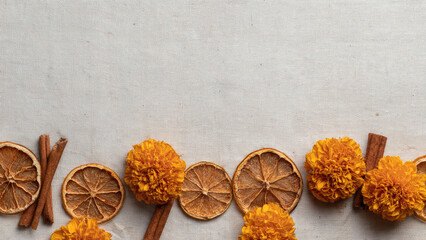 Fototapeta premium Marigold Flowers and Dried Orange Slices