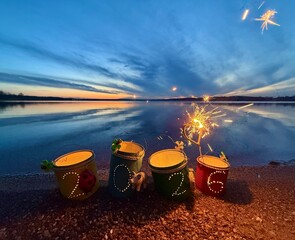sparklers in the new year lanterns at the beach