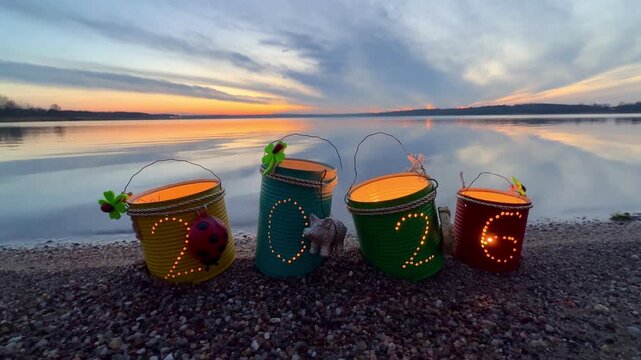 sunset at the beach with tin cans for 2026 happy new year