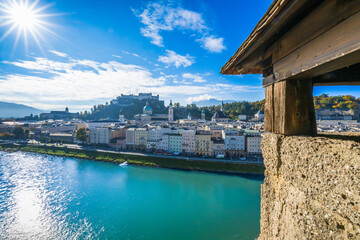 City of Salzburg with Salzach River and Fortress Hochensalzburg in the fall season.