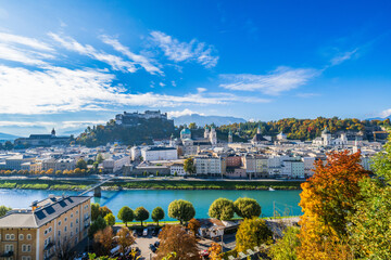 City of Salzburg with Salzach River and Fortress Hochensalzburg in the fall season.