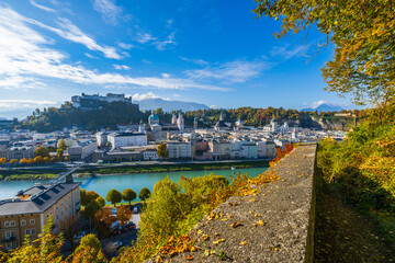 City of Salzburg with Salzach River and Fortress Hochensalzburg in the fall season.