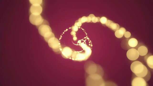 Goldene Bokeh-Punkte auf rotem Hintergrund &ndash; eleganter, festlicher Lichteffekt