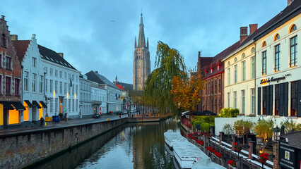 Medieval architecture on the autumn streets of historic center of Bruges, Belgium, October 20, 2025.
