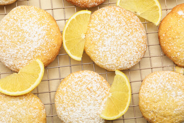 Tasty lemon cookies with fruit slices on white table, top view