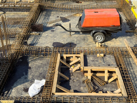 Portable compressor machine at a construction site
