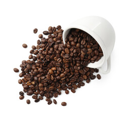 Aromatic coffee beans and overturned cup isolated on white, above view