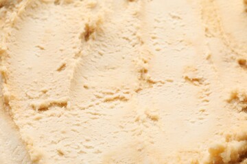 Tasty vanilla ice cream as background, closeup