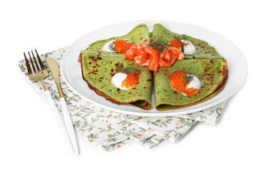 Tasty spinach crepes with salmon, red caviar, sour cream and dill isolated on white
