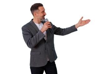 Man delivering a public speech, holding a microphone and gesturing while presenting to an audience. Transparent background