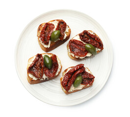 Delicious bruschettas with cream cheese, sun-dried tomatoes and green olives isolated on white, top view