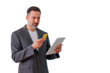 Mature man online shopping using credit card and tablet for secure e-commerce payment on transparent background