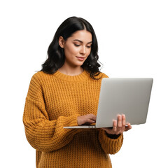 Naklejka premium A focused young woman holds and works on a silver laptop while wearing a warm, yellow knit sweater. isolated on transparent background