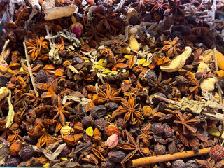 Star anise pods and dried spices creating a richly textured aromatic blend in Istanbul bazaar. Traditional seasoning, herbal infusions, and culinary heritage highlighted through natural forms and