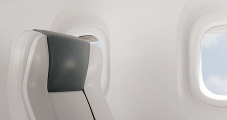 Empty air plane seats. Blue sky and clouds in the window. Airplane interior 