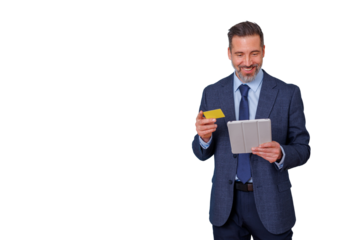 Businessman making online payment with tablet and credit card, happy with e-commerce transaction