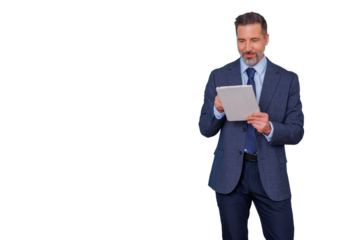 Mature businessman in suit using digital tablet, engaging with technology, standing confident on transparent background