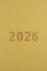 Números de año nuevo de 2026 sobre fondo dorado