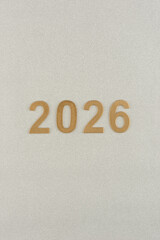 Números de año nuevo de 2026 sobre fondo gris