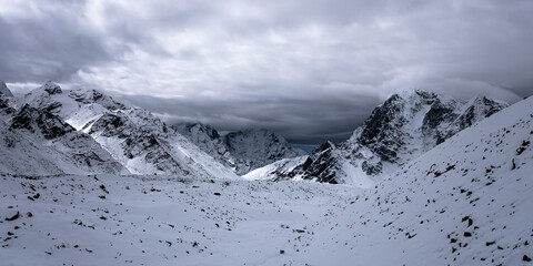 Snow covered Khumbu icefall under the dark clouds. View from Kala Pattar peak on the Everest base camp trek, Nepal.