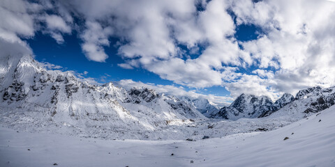 Panoramic view of the huge Khumbu glacier flowing in the valley and Gorak Shep lodges near it. Kala Patthar, the highest point of Everest base camp trekking, Nepal.