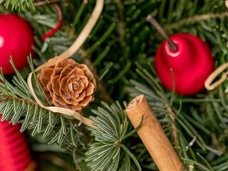 natural spruce branches decorated with pine cones