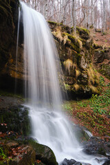 Side view of scenic Skok waterfall on Old Mountain during autumn season © Nikola