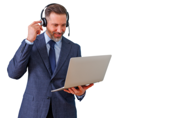 Mature businessman working remotely, having video call or online conference, wearing headset and holding laptop, transparent background