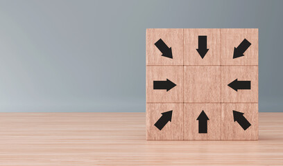 Arrow head icons on wooden blocks