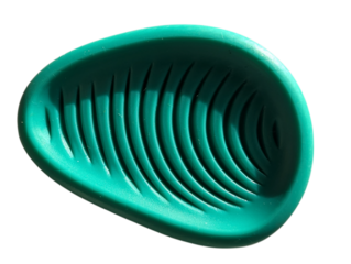 Green silicone worry stone with ribbed texture for stress relief, anxiety calming and mindfulness practices.