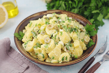 A bowl with Greek potato salads