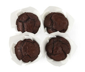 Tasty chocolate muffins isolated on white, top view