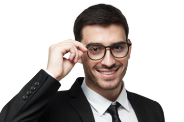 Happy young businessman in a black suit adjusting his glasses with a cheerful expression